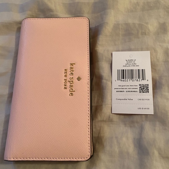 Kate Spade, Large slim bifold leather wallet. New with tags, chalk pink color. - Picture 4 of 10